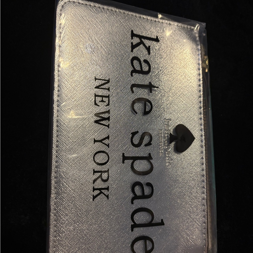kate spade silver metallic logo wristlet